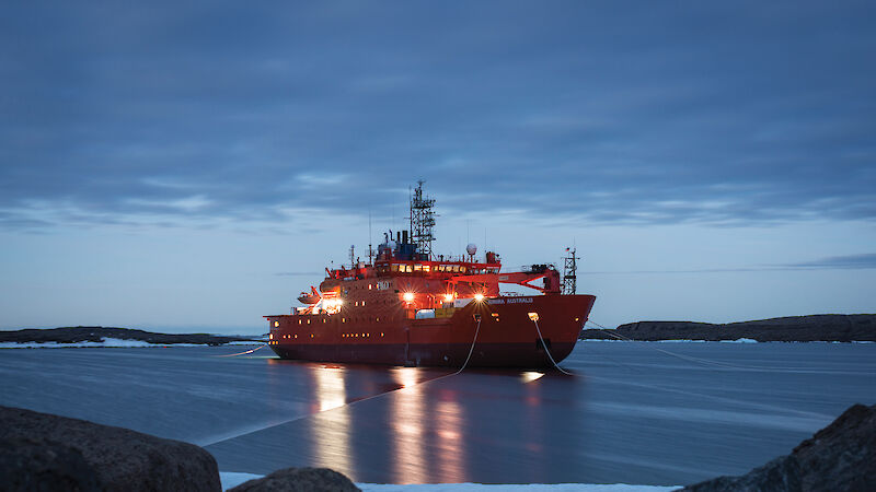 The Aurora Australis moored in Horseshoe Harbour, Mawson, at twilight