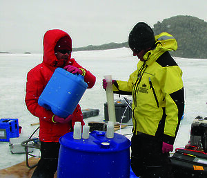 Professor Rick Cavicchioli (left) and Torsten Thomas, both from UNSW, process microbial samples collected at Ace Lake – a source of cold-loving methanogens.