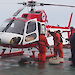 Dr Alison Kohout (left) prepares to deploy wave sensors on ice floes deep in the Marginal Ice Zone, accessible only by helicopter.