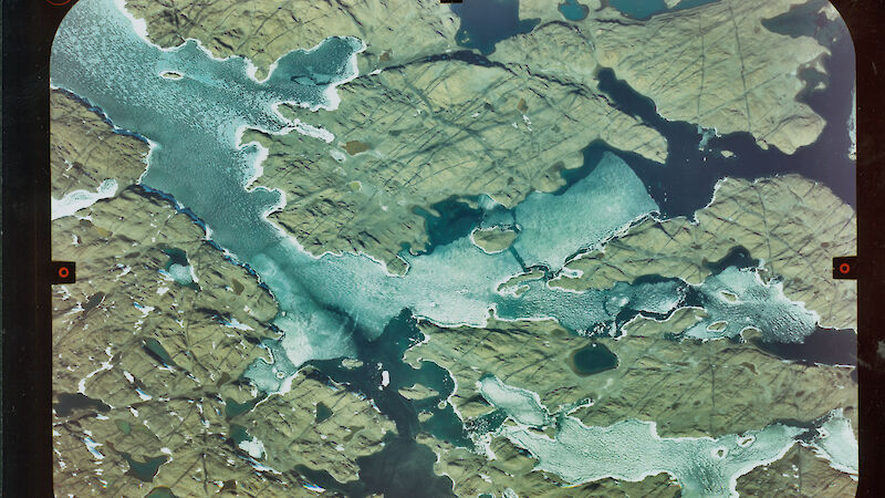 A vertical aerial photograph of the Long Fjord area of the Vestfold Hills, Antarctica, photographed at 4500 metres above sea level with the Zeiss camera, 11 February 1997.