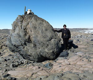 Barbara Frankel with an example of a huge boulder dropped by the ice sheet.