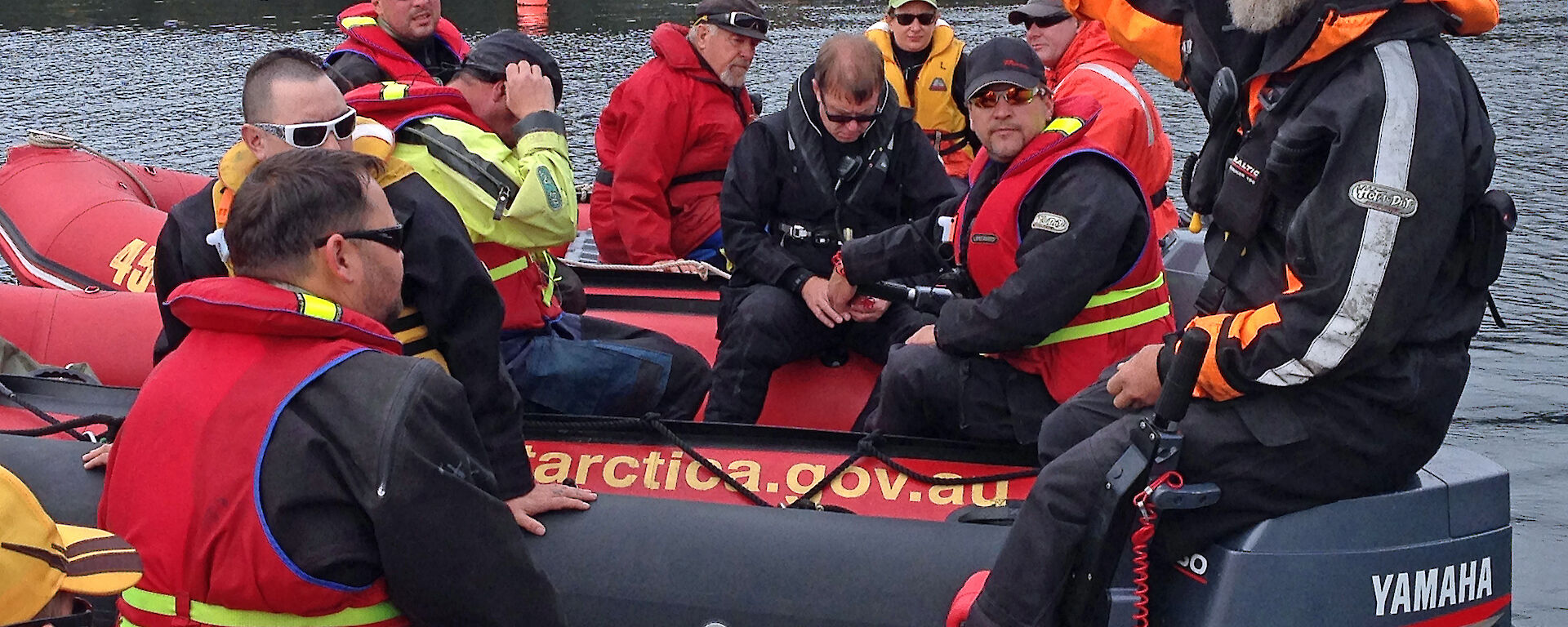 Australian Antarctic Division Watercraft Operator, Mick Davidson (right) explains the unique characteristics of boating in Antarctica