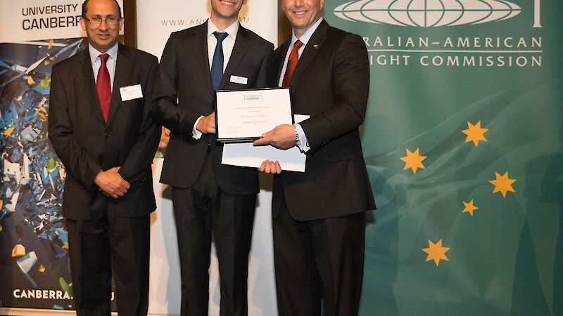 David receives his award from US Ambassador to Australia Jeffrey L Bleich