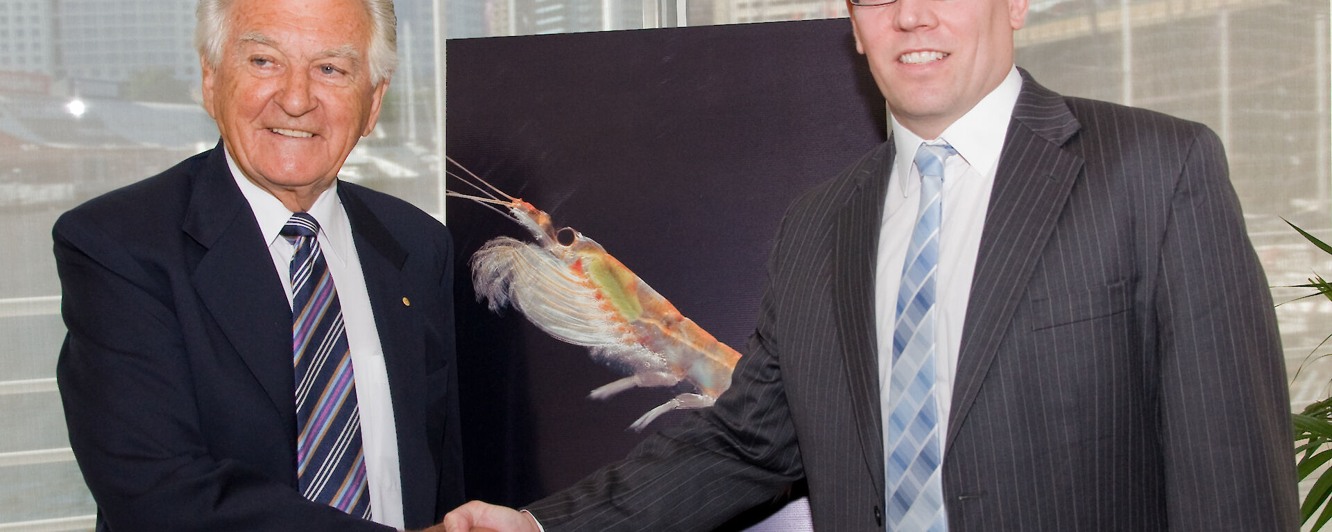 Former Australian Prime Minister Bob Hawke congratulates Dr Bruce Deagle, the first recipient of the R.J.L. Hawke Post-Doctoral Fellowship for Antarctic Environmental Science, in 2011