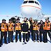 Federal Environment Minister the Hon. Tony Burke and the ground crew of Wilkins Runway in front of the A319 Airbus