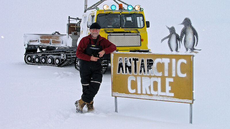 Kim stops at the Antarctic Circle on his way from Casey to visit the new Wilkins Runway in 2007.