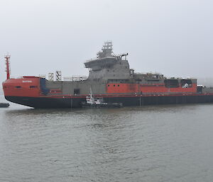 Tugs pushing the Nuyina in the River Danube.