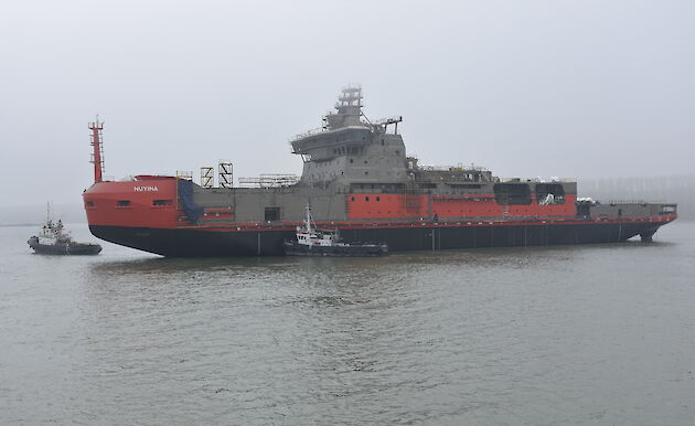 Tugs pushing the Nuyina in the River Danube.