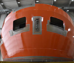 A section of the new ship painted in International Orange.