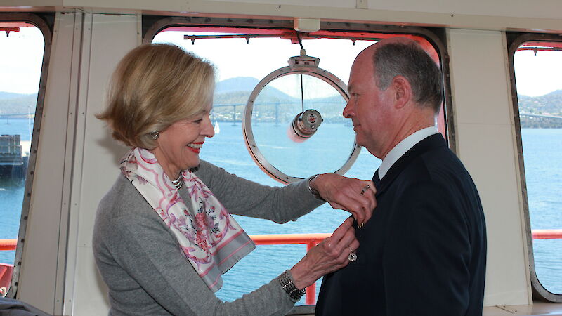 Governor-General pinning medal on Captain Doyle