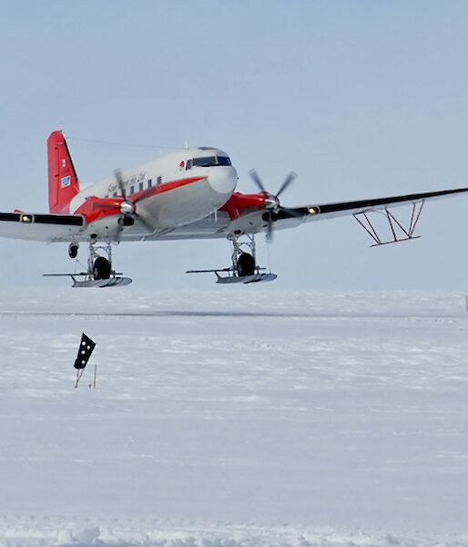 The 72 year old Basler BT-67 aircraft with its wing-mounted, ice penetrating radar antennae.