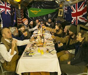 Expeditioners making a toast in period costume