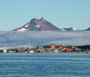 View from the water with mountains behind Mawson