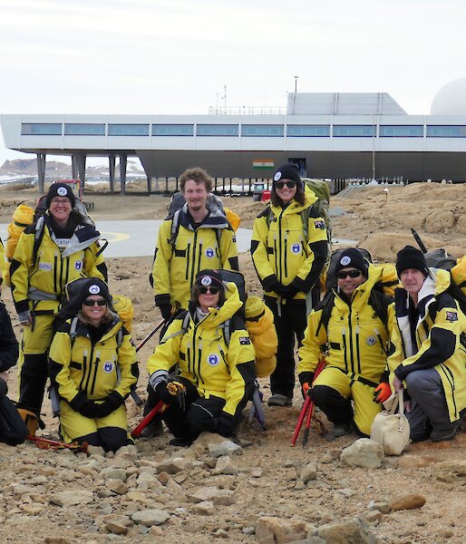 group of expeditioners in front of station building