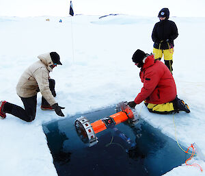 Deploying the robot in a hole in the sea-ice