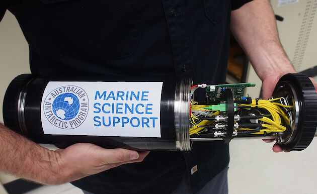 The deep-water laser showing its titanium housing and wiring.