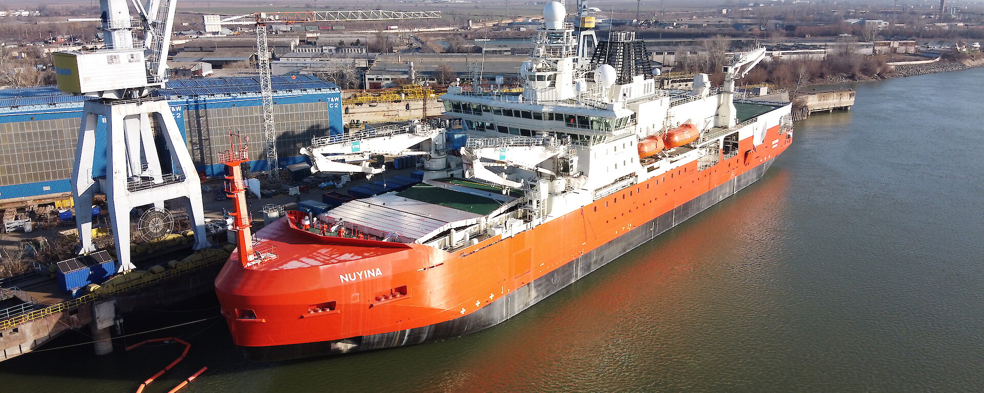 Aerial photo of the Nuyina beside the wharf in Romania.