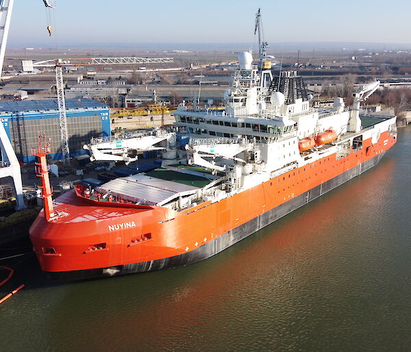 Aerial photo of the Nuyina beside the wharf in Romania.