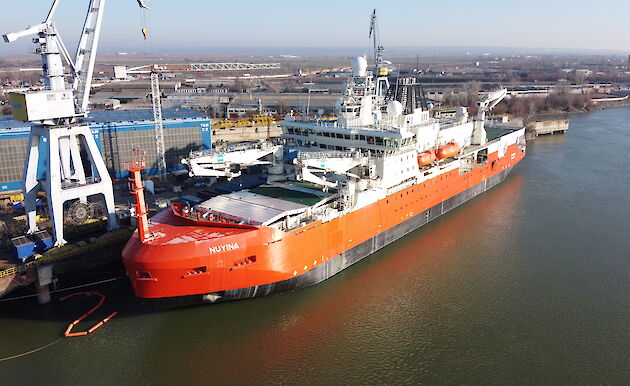 Aerial photo of the Nuyina beside the wharf in Romania.