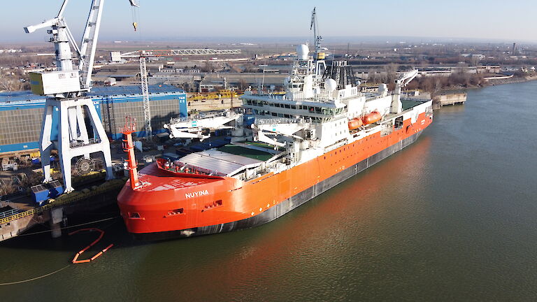 Aerial photo of the Nuyina beside the wharf in Romania.