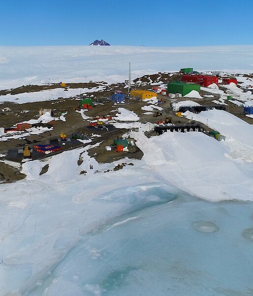 aerial view of Mawson station in snow