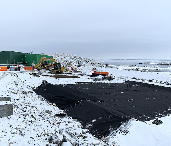 geotextile completely covering mega-pile