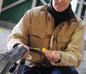 Engineering Services Supervisor inspecting cable stock