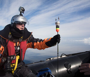 scientist in whale research boat