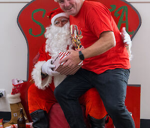 Simon Langdon receives his parcel from Santa