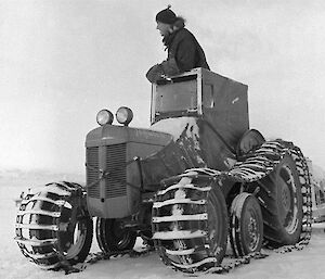 Man on a tractor on the ice