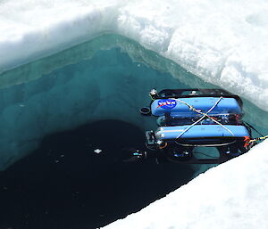 A small robot floating in sea ice