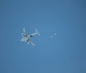 The C17 aircraft off loads a parachute