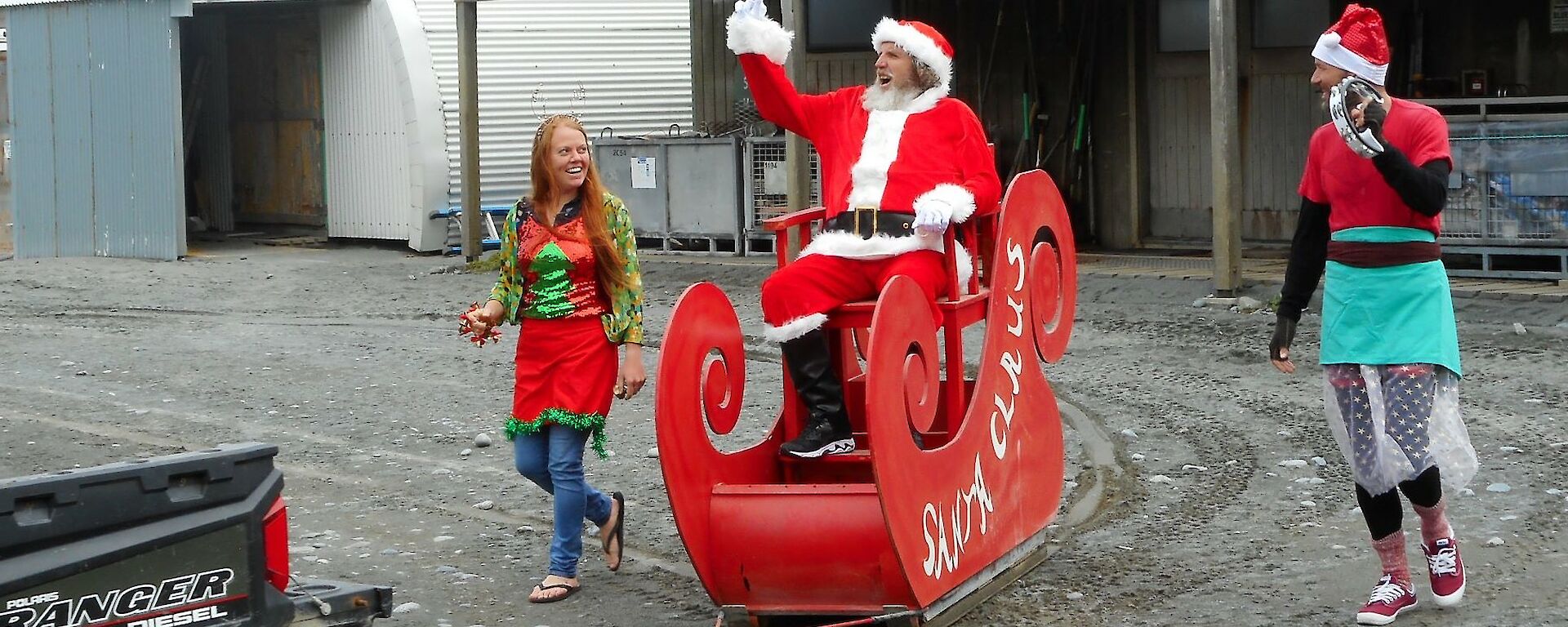 Santa arrives on Christmas day at Macqurie Island station in a sleigh