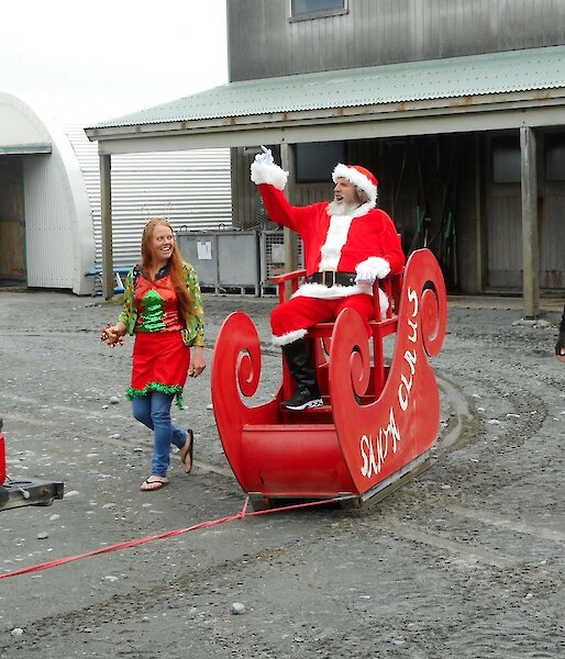 Santa arrives on Christmas day at Macqurie Island station in a sleigh