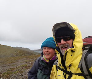 two expeditioners walking on Macquarie Island