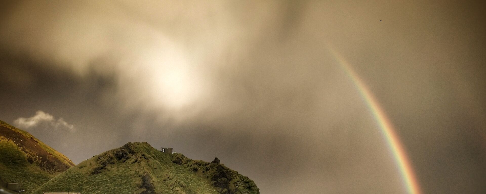 storm cloud and rainbow