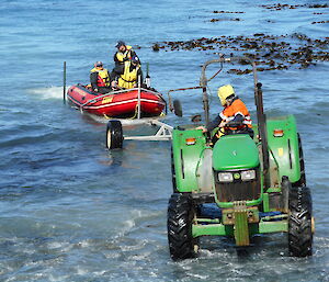 Boat landing on trailer with tractor