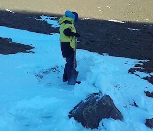 AAD expeditioner setting up an overnight bivvy spot — Framnes Mountains.