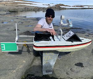 A man with his motorised boat