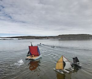 Homemade and motorised boats in the water