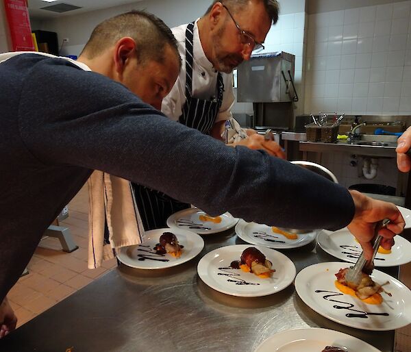 Plating up the Mawson end of season dinner 2019–20 with Chef Kim De Laive.