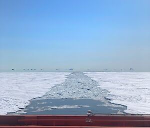 Looking back from the ship at a long trail of broken sea ice