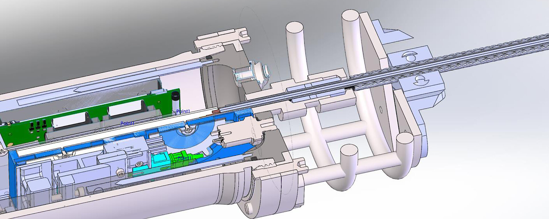 A model showing how the electrical-optical-mechanical cable fits into a pressure housing.