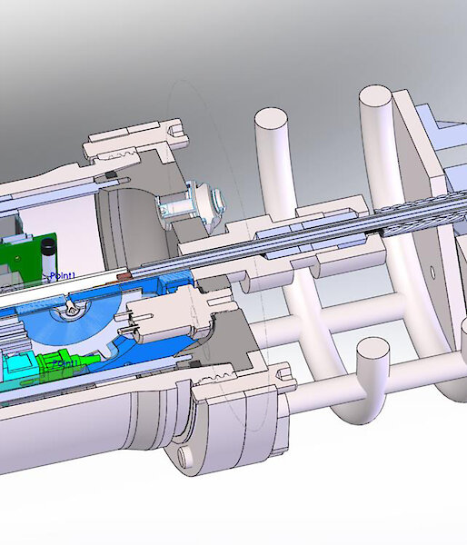 A model showing how the electrical-optical-mechanical cable fits into a pressure housing.