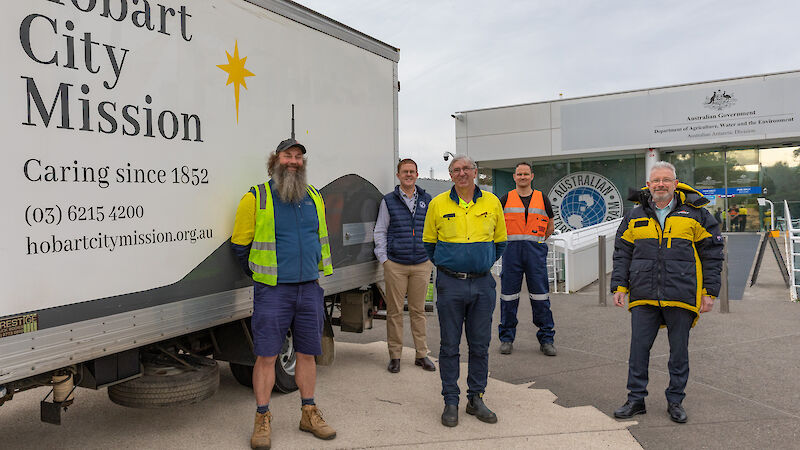 Group photo of Hobart City Mission and Australian Antarctic Division staff at head office