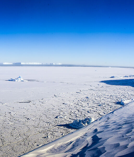 person in panorama of icy landscape