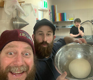 Two expeditioners in the kitchen making bread