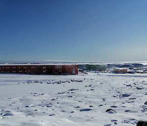 A snowy landscape picture of the the main living building