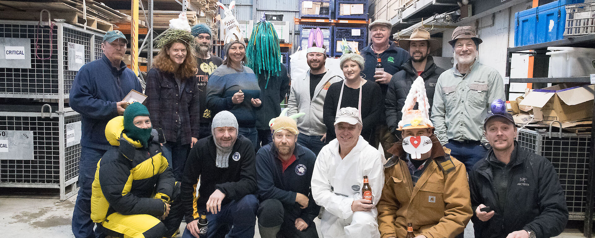 Group photo of everyone wearing hand crafted Easter themed hats