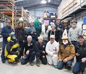 Group photo of everyone wearing hand crafted Easter themed hats